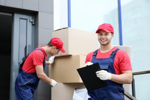 Professional movers carefully handling a Belgravia home relocation