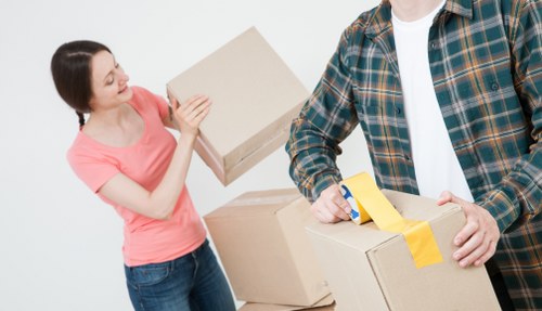 Moving company staff acknowledging a client concern