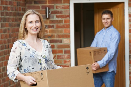 Packed boxes and moving equipment prepared for collection